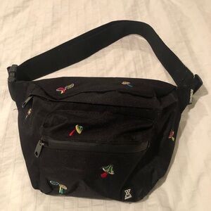 Arsenic brand waist bag with Embroidered mushroom Details.